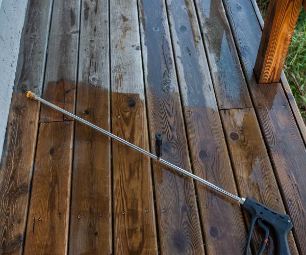 professional pressure washing equipment on wooden floors